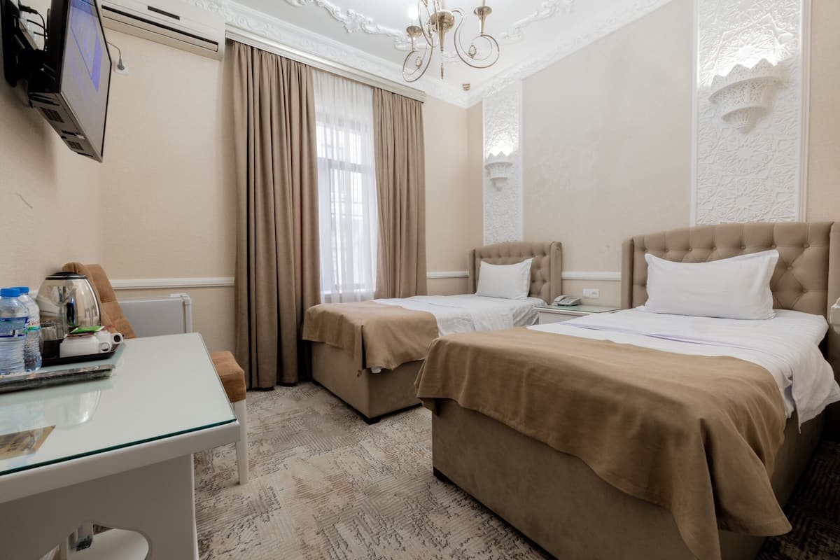 Roupas de cama premium, edredons de pluma, frigobar