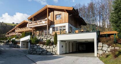 Posh Chalet with Heated Pool, Hot Tub, Sauna in Piesendorf
