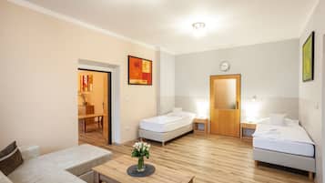 Apartment, 2 Bedrooms | Living area | Flat-screen TV, DVD player