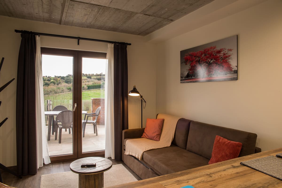 Appartement, 1 slaapkamer, terras | Woonruimte | Een smart-tv