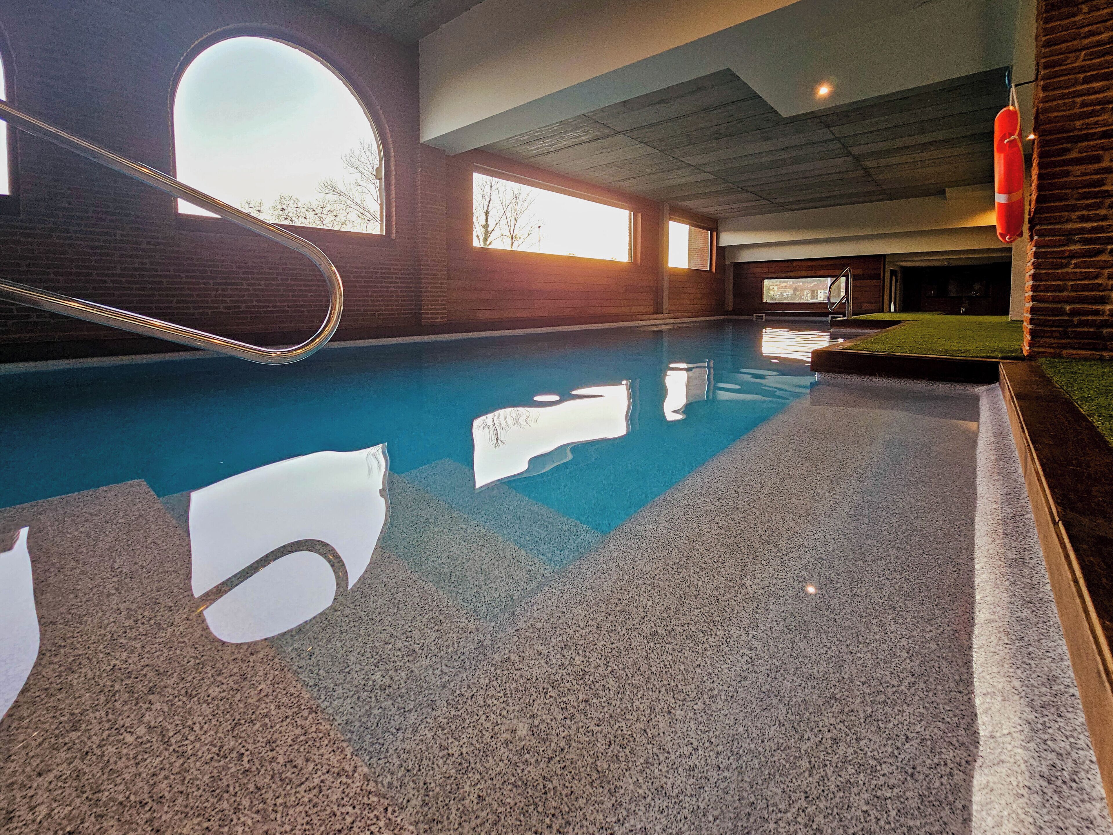 Indoor pool, seasonal outdoor pool, open noon to 8:00 PM, pool loungers