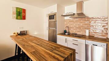 Apartment, 2 Bedrooms | Living area | Smart TV