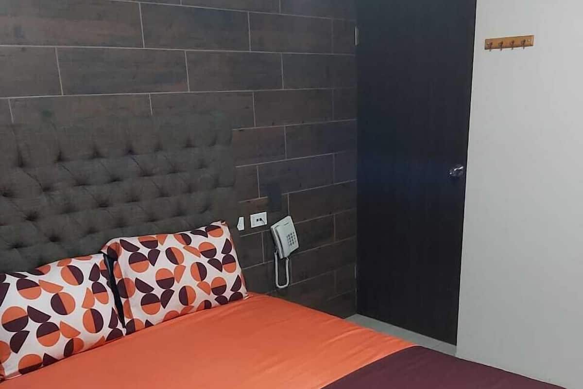 Basic Room | Premium bedding, down comforters, iron/ironing board, WiFi (free)