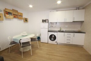 Fridge, microwave, stovetop, cookware/dishes/utensils