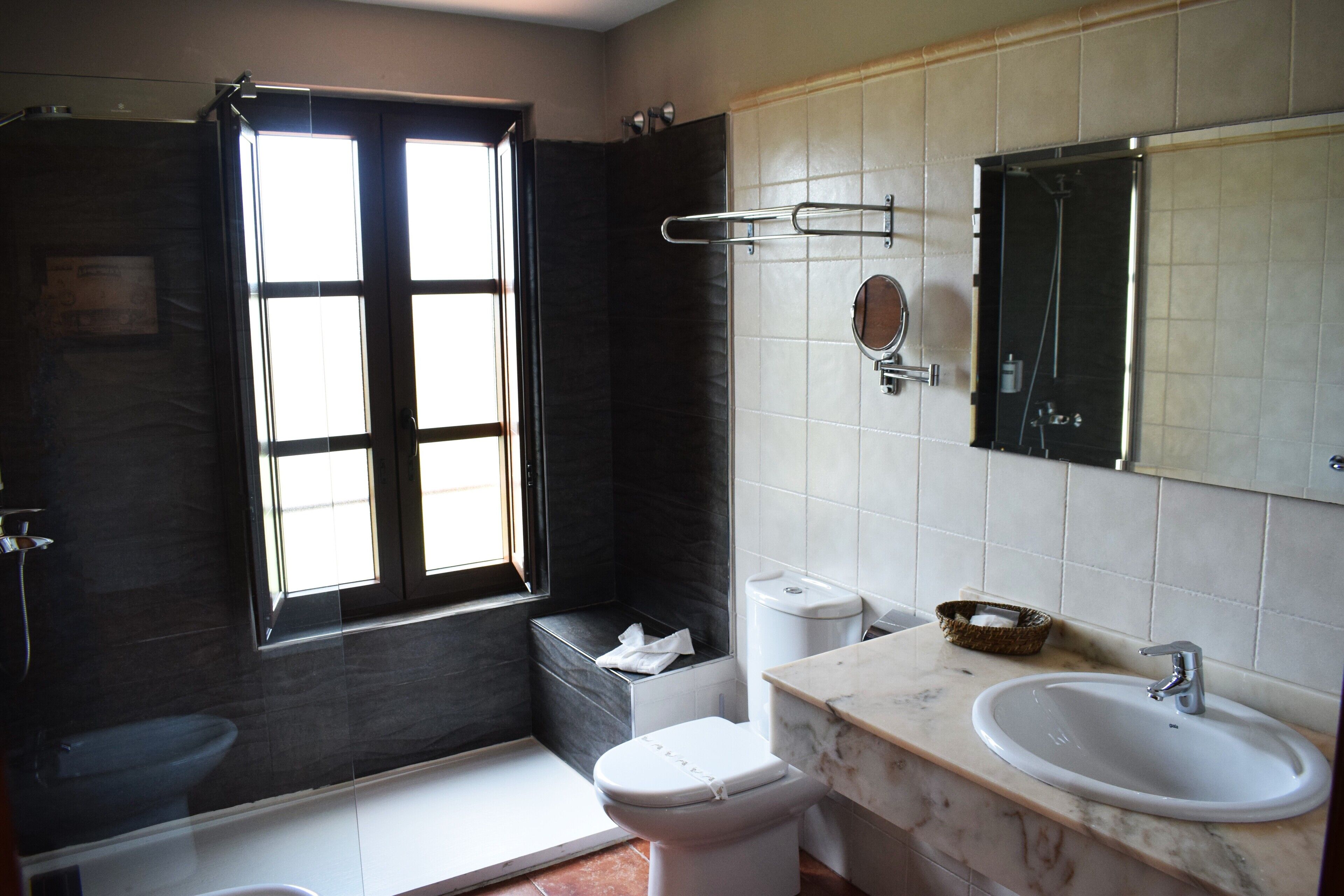 superior double room | bathroom | free toiletries, hair dryer, towels