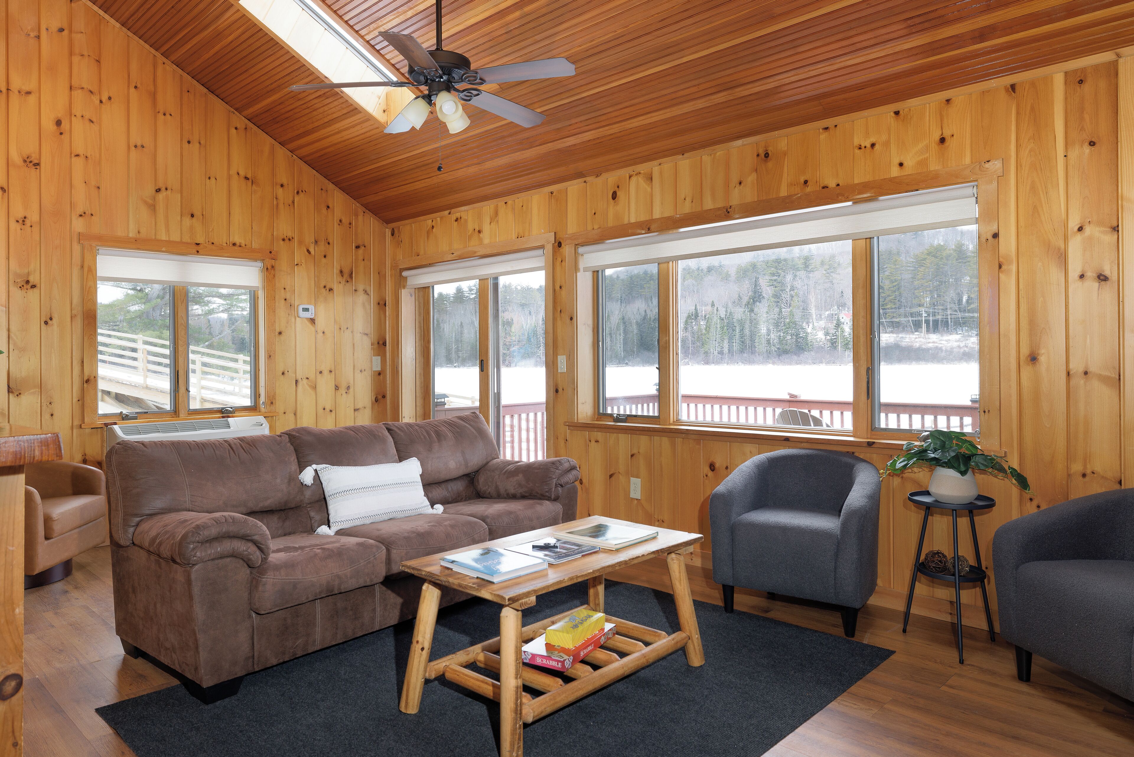 Rosewood Cottage #10: Spacious Lakefront Log Cabin with Stunning Lake Views | Living area | 32-inch Smart TV with digital channels, TV