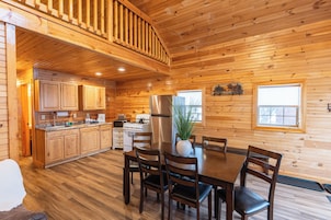 White Mtn Cabin for 14 w/ Lake & Sauna | Living area