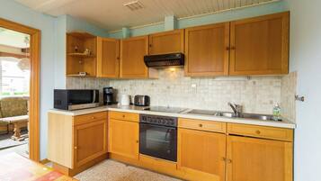 Cottage | Privékeuken | Een kinderstoel