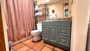 Bathtub, hair dryer, towels