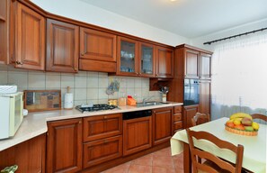 Standard Apartment, 1 Bedroom (21272) | Private kitchen | Fridge, coffee/tea maker, electric kettle, cookware/dishes/utensils