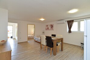 Standard Apartment, 1 Bedroom (23207) | Living area | TV - Apartment 1890 (Marcana)