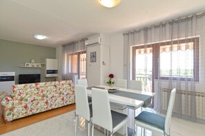 Standard Apartment, 2 Bedrooms (23274) | Living area | Flat-screen TV - Apartment 1899 (Rovinj)