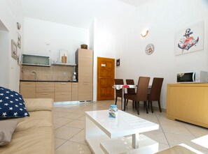 Standard Apartment, 2 Bedrooms (26156) | Living area | TV - Apartment 1970 (Medulin)
