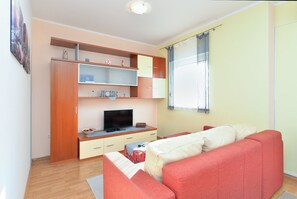 Standard Apartment, 2 Bedrooms (27029) | Living area | TV - Apartment 1982 (Medulin)