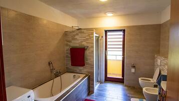 Standard Apartment, 4 Bedrooms (27302) | Bathroom | Separate bathtub and shower, deep-soaking bathtub, hair dryer, towels