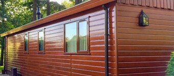 Chalet in Holiday Park With Spacious Living Room, Large Enclosed Garden and Unobstructed View