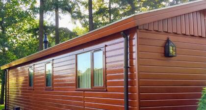 Chalet in Holiday Park With Spacious Living Room, Large Enclosed Garden and Unobstructed View