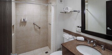 Junior King | Bathroom | Shower, rainfall showerhead, hair dryer, towels