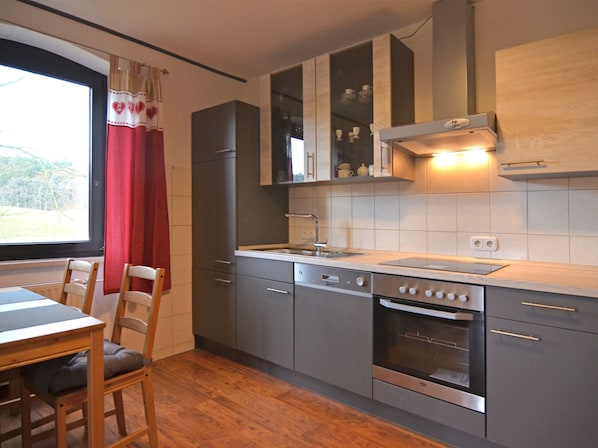 Appartement | Cuisine privée | Chaise haute