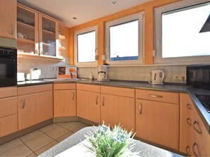 Apartamento | Cocina privada | Trona infantil