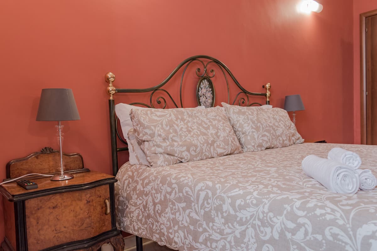 Premium bedding, down duvets, desk, laptop workspace