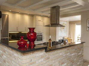Vila | Cozinha privada | Geladeira, cooktop, cafeteira/chaleira