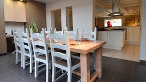 A modern kitchen with a dining area. - Vintage Villa in Knokke-Heist near Beach (Knokke-Heist)