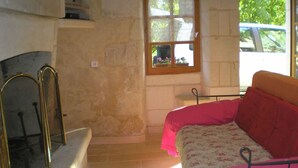 House | Living room | Fireplace, DVD player - Atmospheric Holiday Home With Large Garden in the Historical Region of Thuré (Thure)