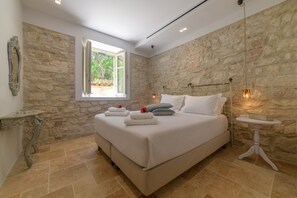 1 غرفة نوم ومكواة/لوح كي وواي فاي وملاءات أسرّة