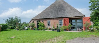 Farmhouse by Lauwers River With Rowing Boat