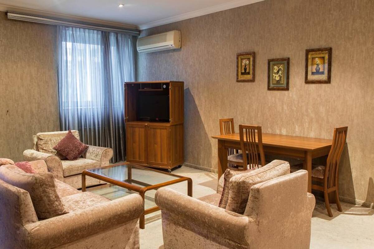Suite Deluxe | Área de sala de estar