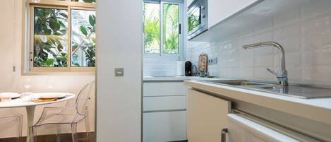 Fridge, microwave, coffee/tea maker, toaster