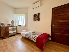2 dormitorios, tabla de planchar con plancha, wifi gratis y ropa de cama