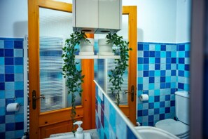 Shower, eco-friendly toiletries, hair dryer, bidet