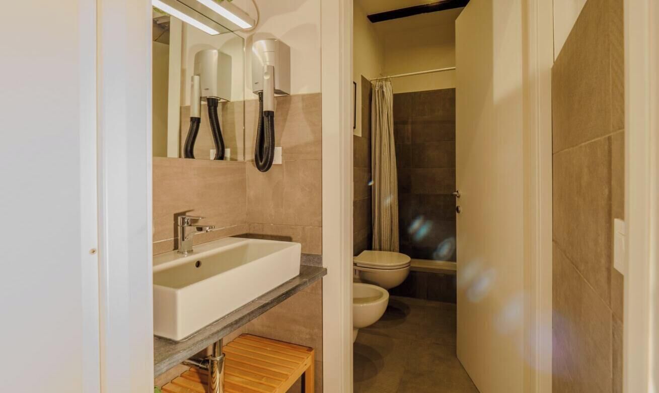 Shower, eco-friendly toiletries, hair dryer, bidet