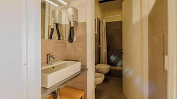 Shower, eco-friendly toiletries, hair dryer, bidet