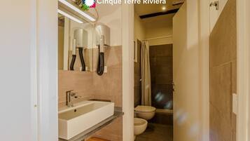 Shower, eco-friendly toiletries, hair dryer, bidet