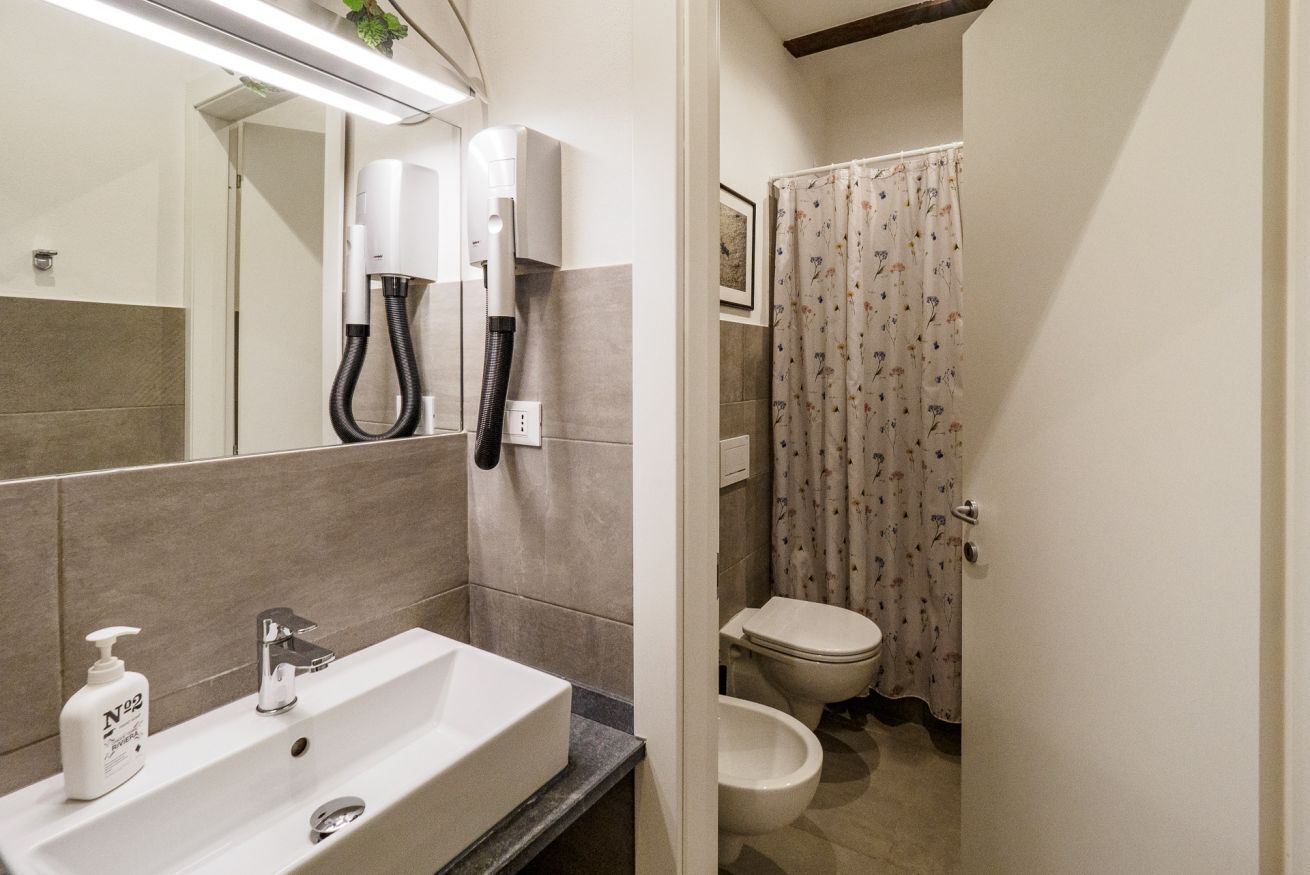 Shower, eco-friendly toiletries, hair dryer, bidet