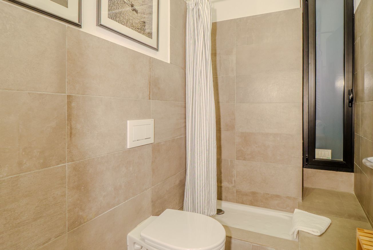 Shower, eco-friendly toiletries, hair dryer, bidet