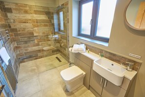 Bathtub, hair dryer, towels