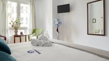 1 dormitorio, tabla de planchar con plancha, wifi gratis y ropa de cama