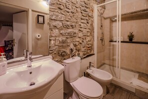 Shower, eco-friendly toiletries, hair dryer, bidet