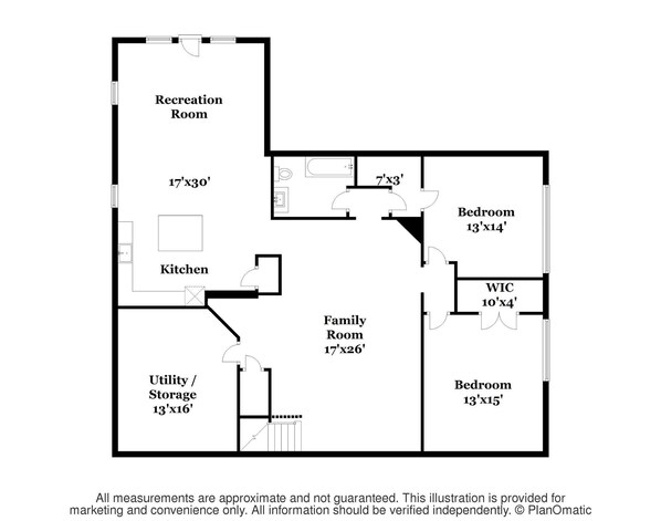 Plan d’étage d’une maison comprenant une salle de jeux, une cuisine, une buanderie/pièce de rangement, un salon et deux chambres.