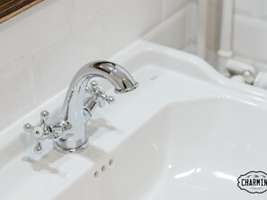 Bathtub, hair dryer, towels