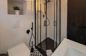 Renovated bathroom with walk-in shower
