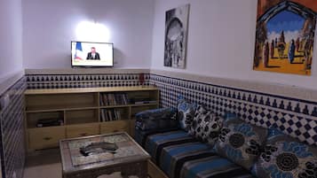 Télévision, lecteur de DVD, livres, médiathÚque
