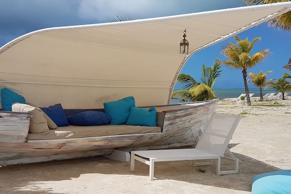 On the beach, sun loungers, beach towels