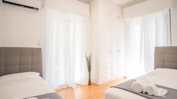 3 habitaciones, tabla de planchar con plancha, wifi y ropa de cama