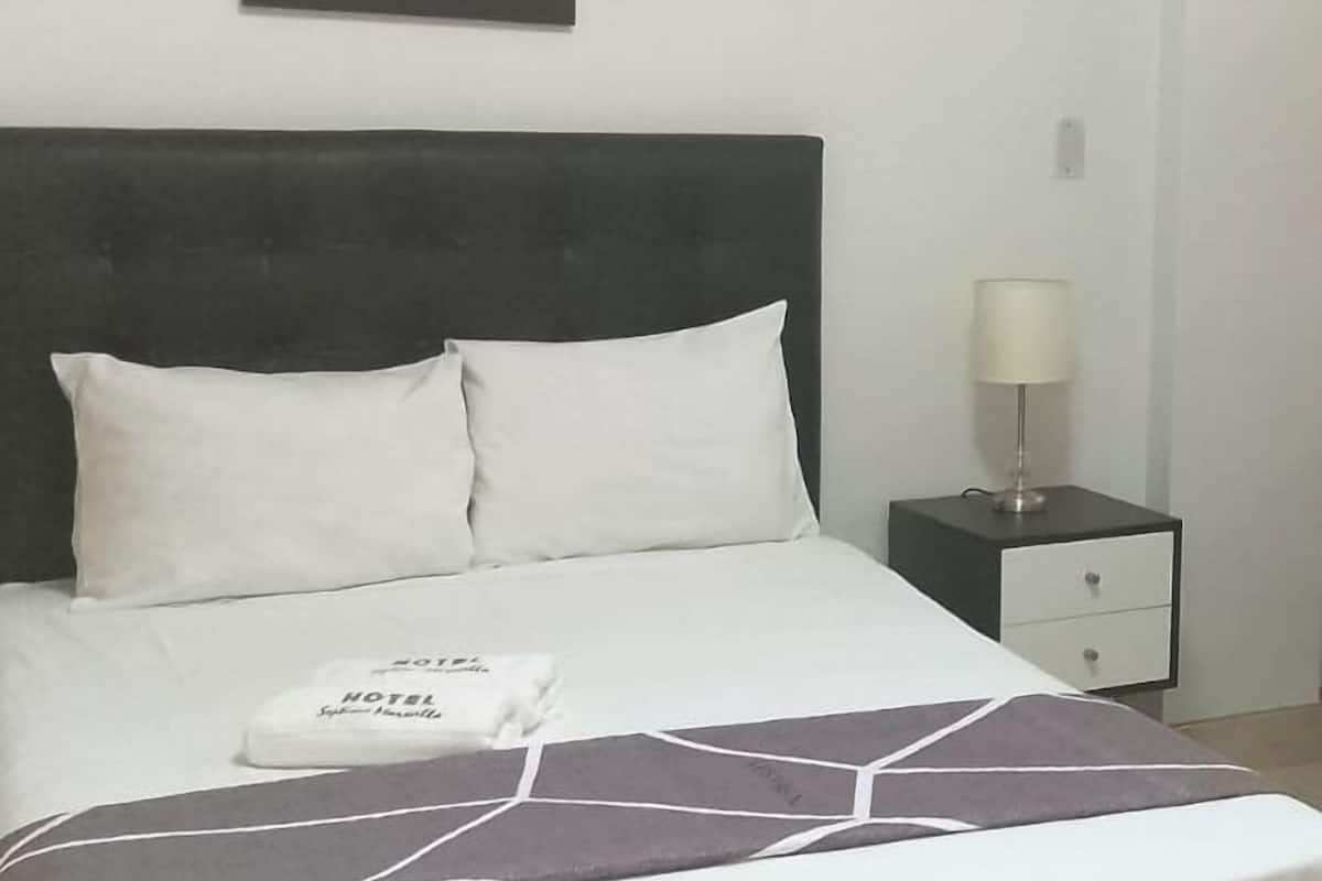Kamer, 1 twee- of 2 eenpersoonsbedden, uitzicht op tuin | Gratis wifi