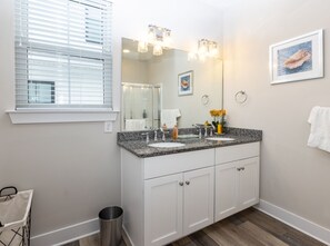 Combined shower/tub, hair dryer, towels, toilet paper